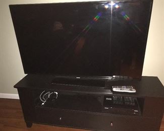 Flat screen tv and stand too