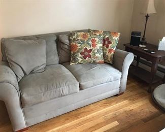 Loveseat with pillows