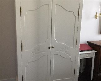 Pine entertainment center painted in French country