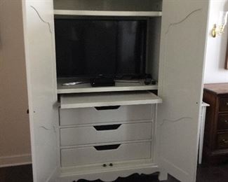 Pine entertainment center with slide out drawer for use as a desk - painted in French country