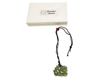 84. BROOKE JARON Carved Green Jade Dragon Pendant