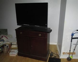 TV cupboard sold separately