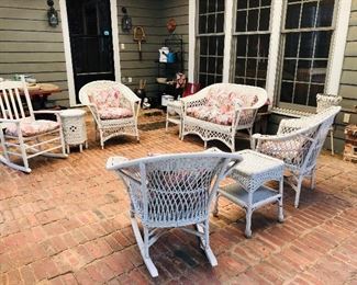Antique wicker porch set with cushions....beautiful
