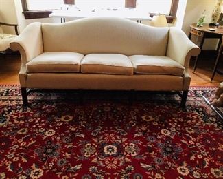 Chippendale sofa /upholstered in a nice neutral off white