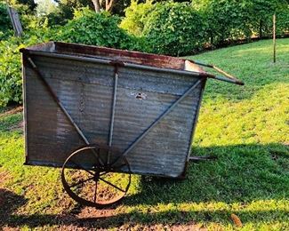 Hand made work cart with old metal wheels/has a tongue to hook to lawnmower