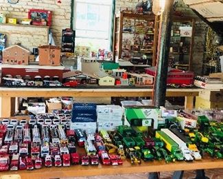 Diecast cars. The background shows the 4x8 display table painted with a road etc for displaying models and cars.