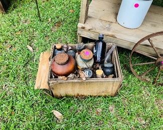 Lots of old boxes and bottles and jars