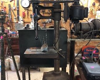 Industrial drill press with bits