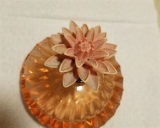 Pink glass with flower top (small chip) $25