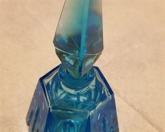 Turquoise faceted with matching stopper (Stopper has a chip at top & bottle has few fleas) $25
