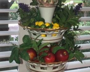 Ok this is an Epergne by Mottahedeh, VA1824. This is a reproduction of the Tobacco Leaf Pattern, commonly found on the China Trade Porcelain in the second half of the 18th Century. Metropolitan Museum of Art. 17" high.