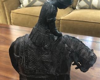 Interesting piece. This is a bronze figurine of St. Francis of Assisi, a replica of a lifesize bronze of the Saint in Assisi by Noberto (see booklet).