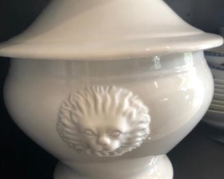 Adorable lion in relief.