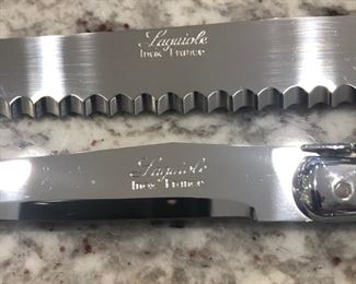 A couple of the knives, by Laguiole, made in France, where they know how to cook, lol.
