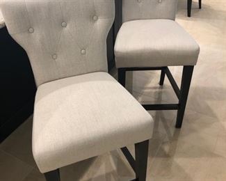 I love these tufted bar stools - we have two for sale.