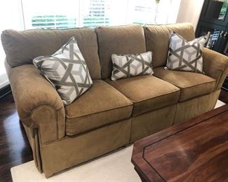 I believe this is a sleeper sofa by Richard Honquest - that said, it's super comfortable, which is unusual for a sleeper sofa...and THAT said, it's awfully heavy, so bring muscle if you plan to buy it!!