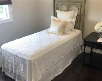 Set of twin beds - we like the headboards and the adult linens on the beds. Beautiful room!