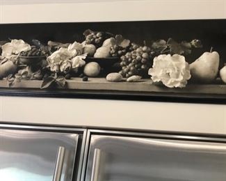 Black and white image above refrigerator