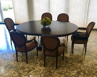 Neat round table and chairs on lower level for card playing or entertaining.