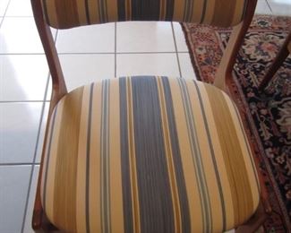 4 TEAK CHAIRS WITH TEAK TABLE WITH PULL OUT LEAVES