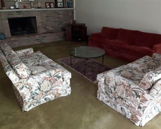 2 Floral Loveseats in really good conditions except for stuffing on the two top pillows.