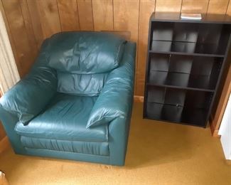 Green Teal Leather Chair, Bookcases. There are many bookcases including painted bookcases throughout the house.