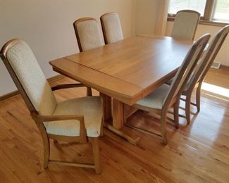Teak Danish Dining room table, six chairs, and pads