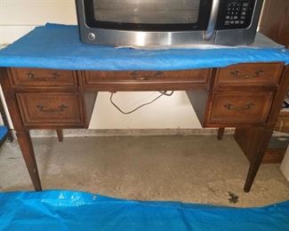 Sewing desk with sewing machine...stay tuned for what kind
