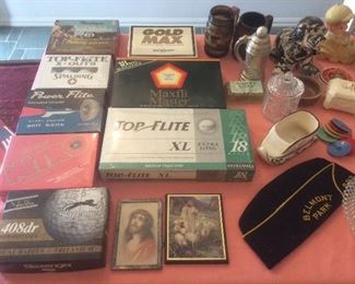 Boxes of golf balls. 