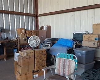 Boxes of Books, Oscillating Fan, Lawn Chairs, Bins with Flight Gear, Drill Press Table Mount, Wooden Work Bench