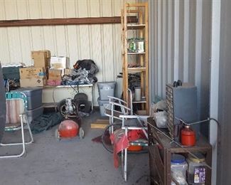 1961 Forney F-1A Trainer SN#5758 Airplane. Tail Side View. Lawn Chairs, Books in Boxes, Compressors, Drill Press Table Mount, Wooden Shelving, Flight Suits in Bins