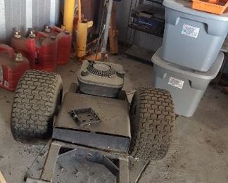 Hand Held Airplane Tow Bars, Hydraulic Jack, Jack Stand, Oil Pan Collector, Airplane Tow Gasoline Unit 5HP, Assorted Gasoline Containers, Electric Airplane Towing Dolly