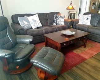 Soft Black leather couches and Chair with ottoman