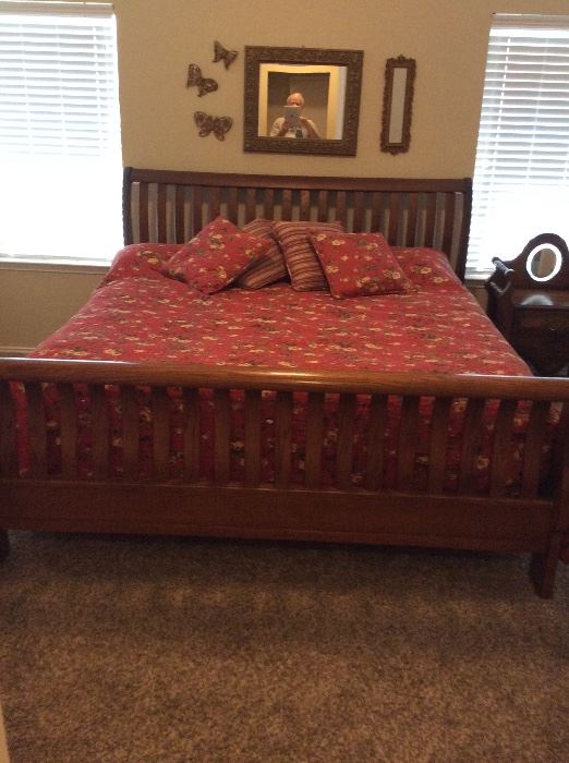 Beautiful king sleigh bed made of solid oak. Very high-quality. Also spring air mattress and box springs
