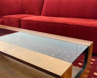 Contemporary  red sofa, contemporary cocktail table with glass and wood top