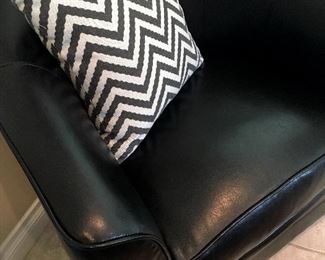 or How About A Black Leather Swivel Chair?...