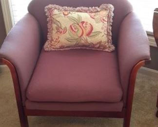 Two upholstered purple chairs. Pillows sold separately.