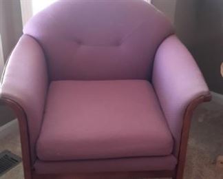 Two upholstered purple chairs. 