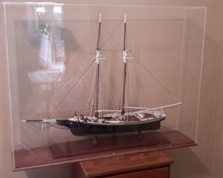 Beautiful model ship in plexiglass case.