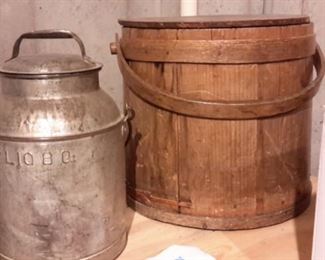 Antique 8 gallon milk can and wood barrel with lid.