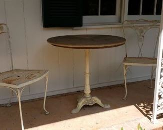 Antique Outdoor cast iron base Table with two chairs