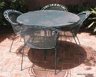 There are Two Matching sets of Outdoor Table and 4 Chairs