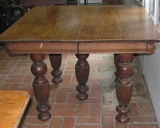 Oak Dining Table with 4 extensions, opens out to 10 feet. 42 inches across