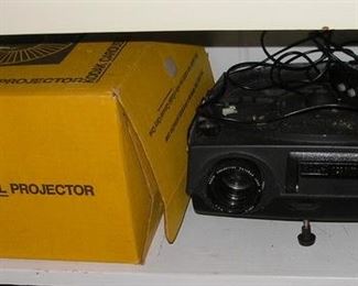 Projector, Carousel and there are two Projector Screens