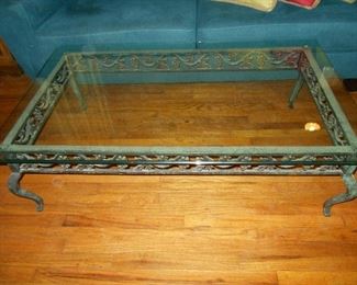 Glass top wrought iron coffee table