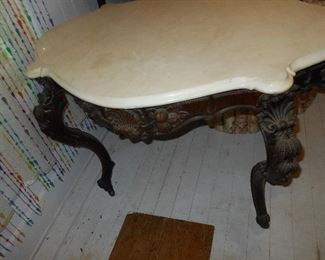 Marble top antique table needing some repair