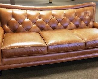 leather button back sofa