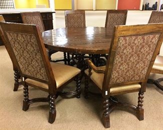 Hand scraped wood table wrought iron base with chairs
