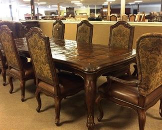 Marge Carson Dining room table with 2 captain and 6 side chairs