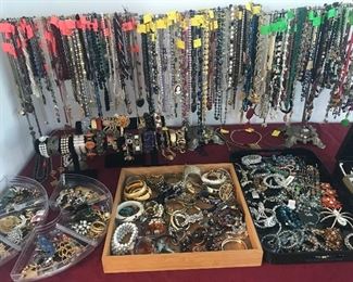 Costume jewelry pins, bracelets and necklaces